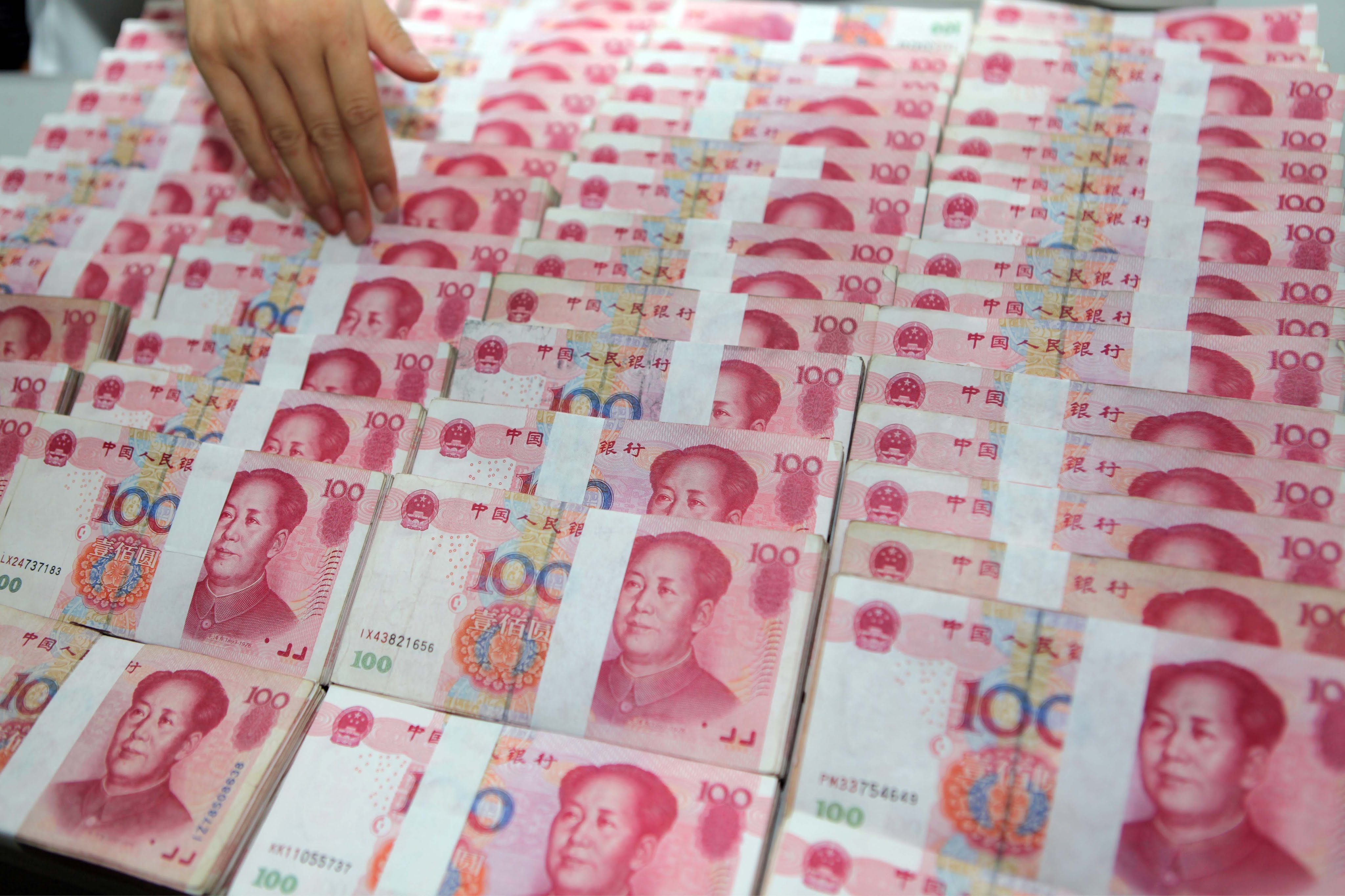 Китайские деньги переводить в рубли. Китай юань. Валюта Китая юань. Современные китайские деньги. Китайский юань купюры.